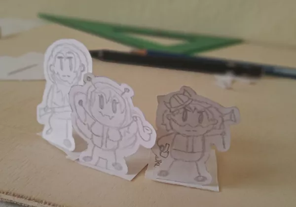 Three small characters made as paper standees, circa 2020 aprox.